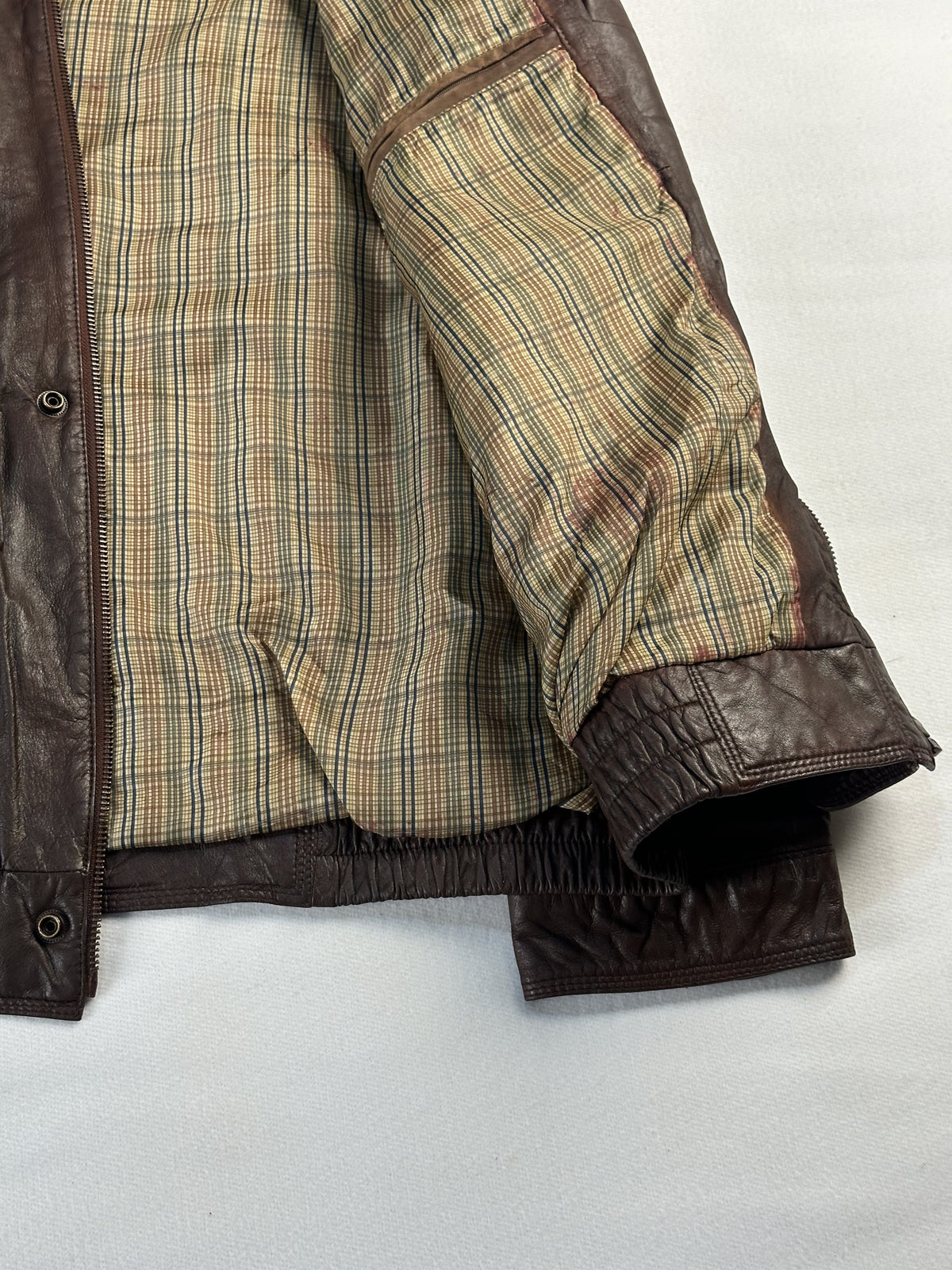Brown real leather harrington with a 23 inch sleeve, size XL