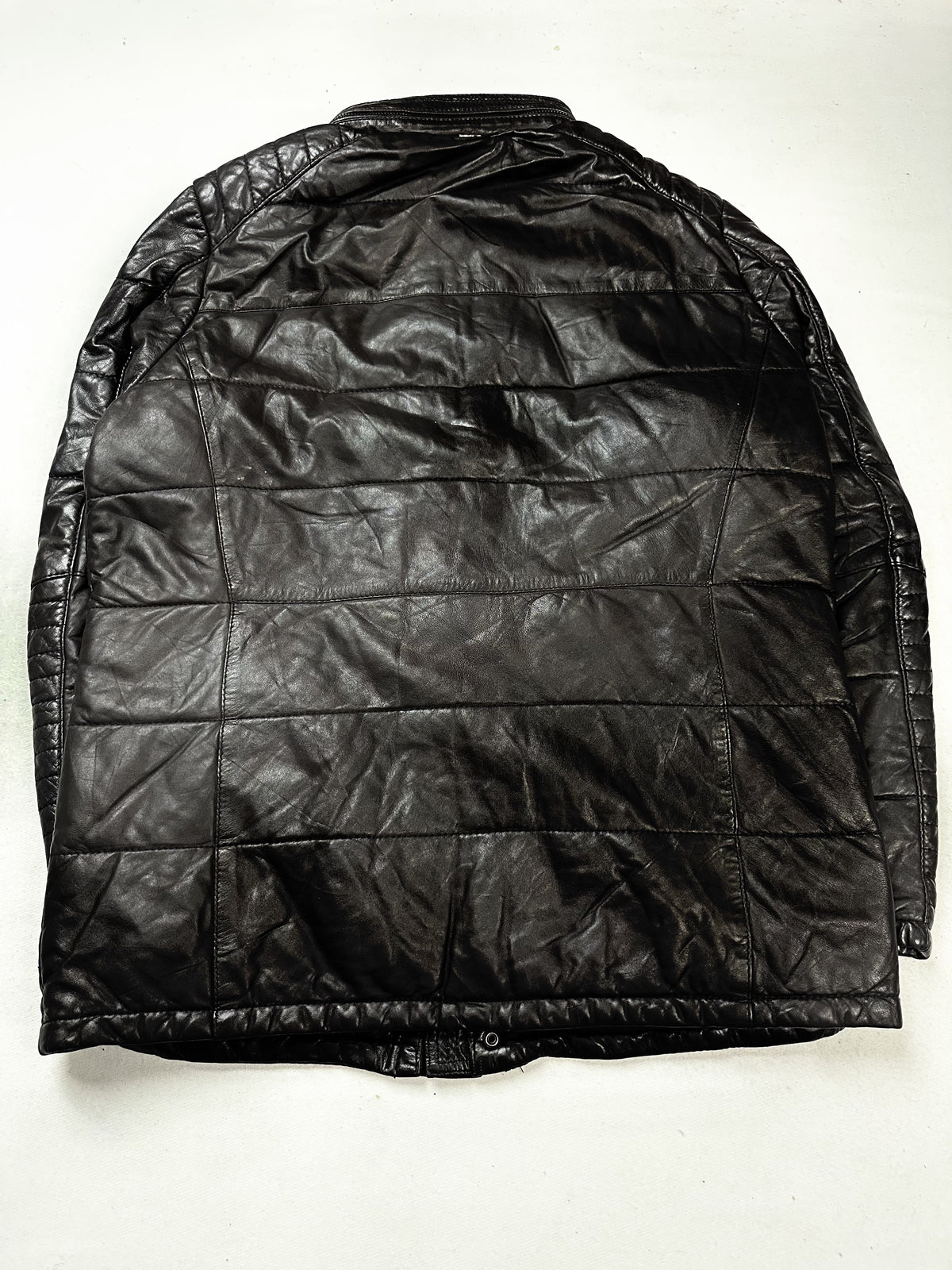 Quilted panel on the brown leather jacket