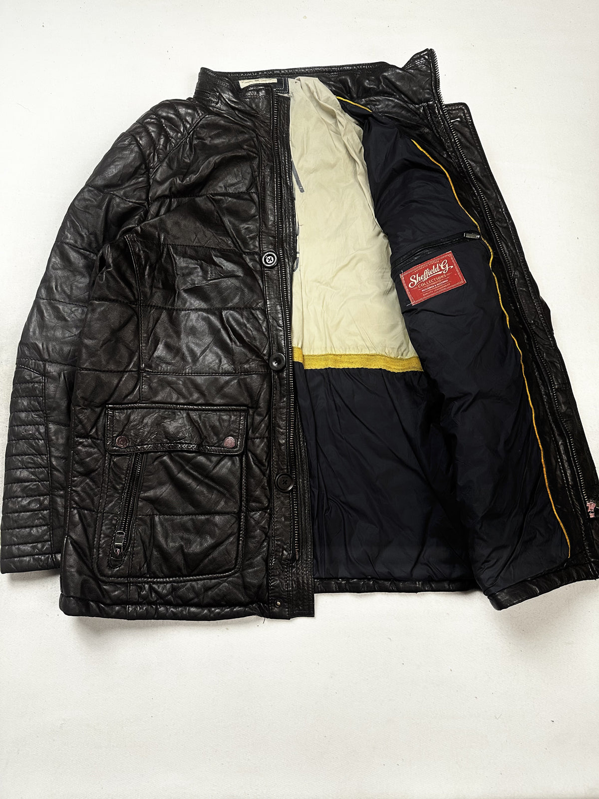 Brown real leather jacket with a 22 inch sleeve, size L