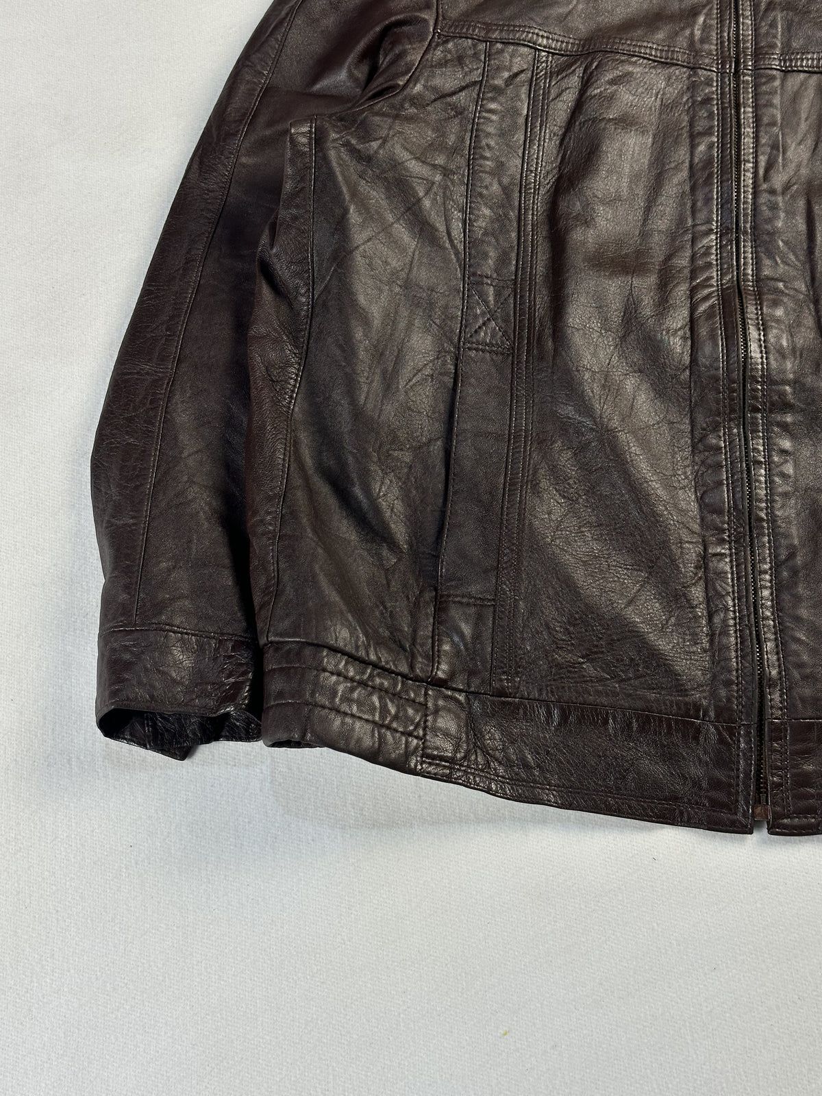 Size L harrington in brown real leather with a 23 inch chest