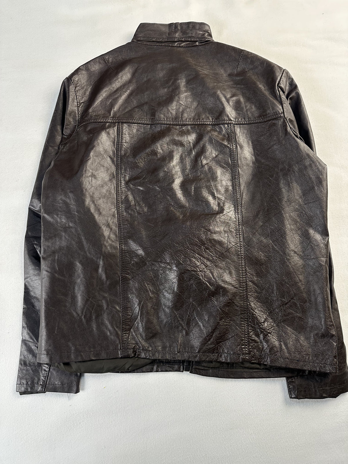 Military styled flap pocket on the brown leather field jacket