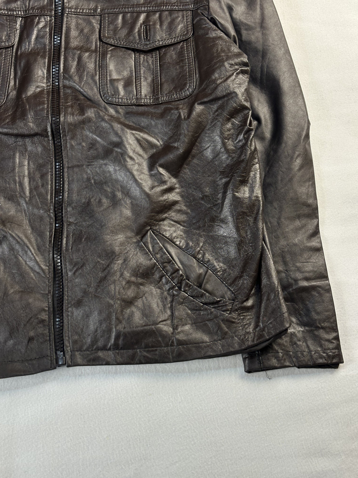 Brown leather field jacket in very good condition, shown in size L