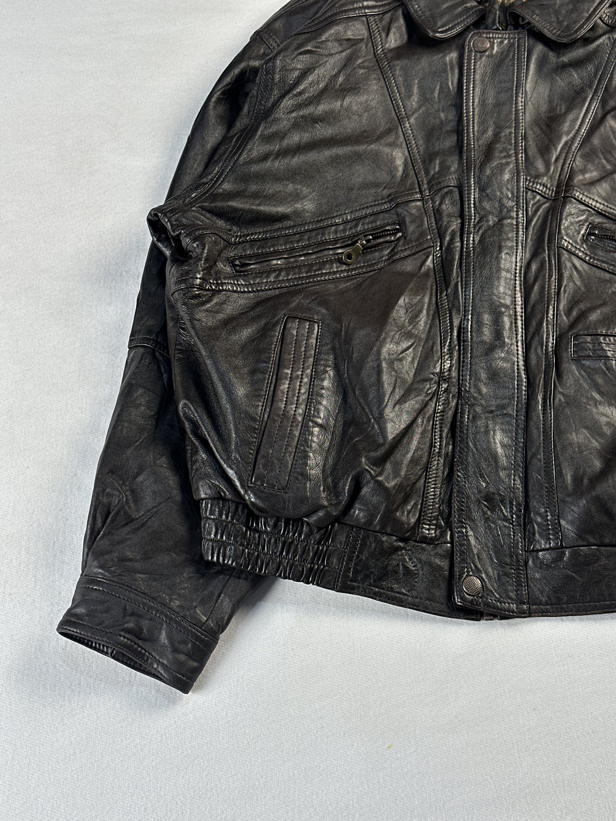 Size L harrington in brown real leather with a 23 inch chest