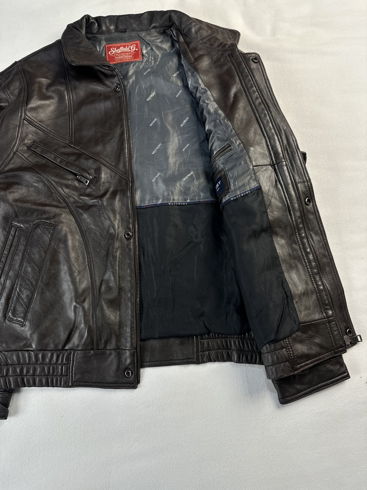 Brown real leather cafe racer with a 24 inch sleeve, size XL