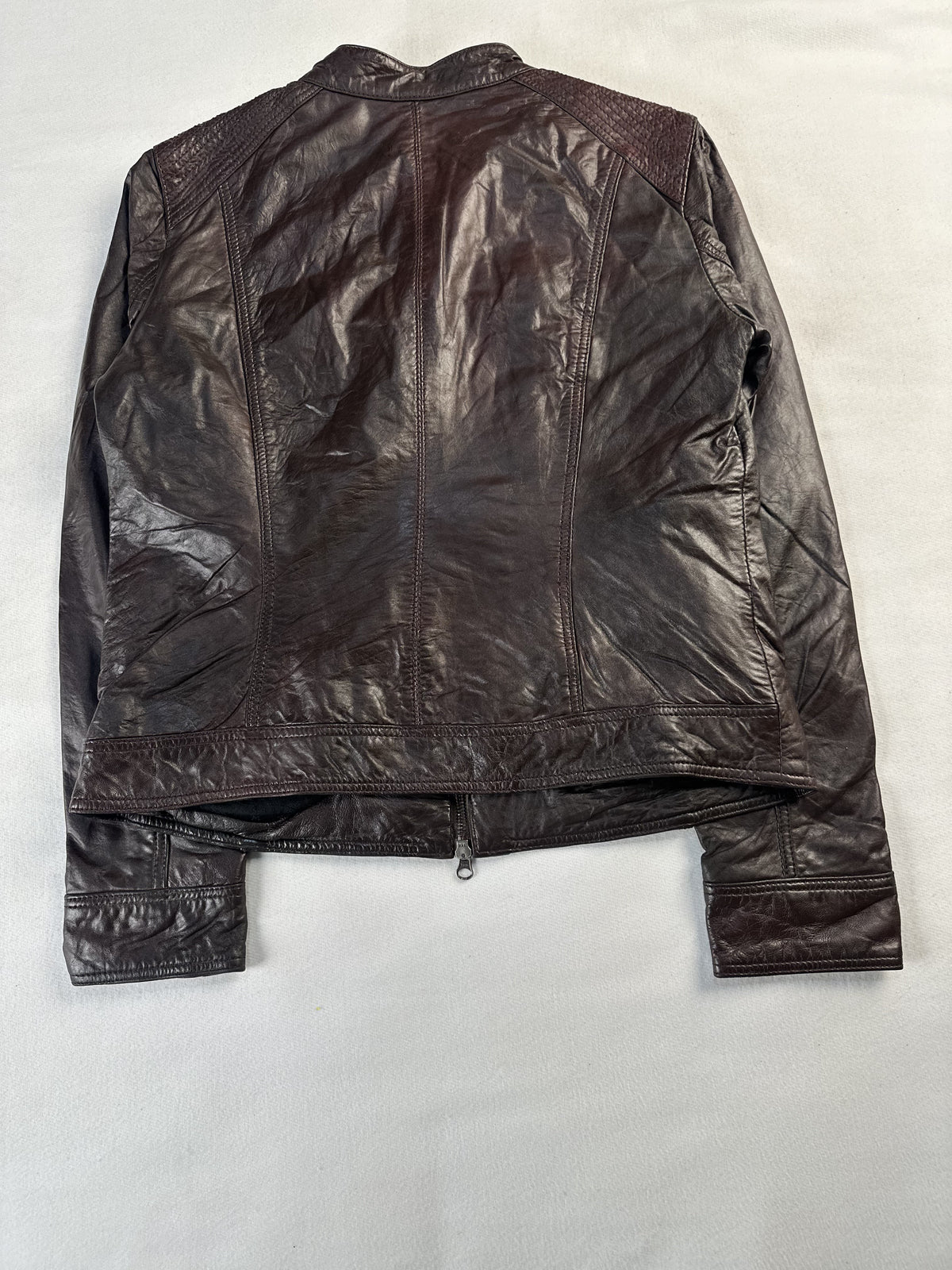 Quilted panel on the brown leather cafe racer