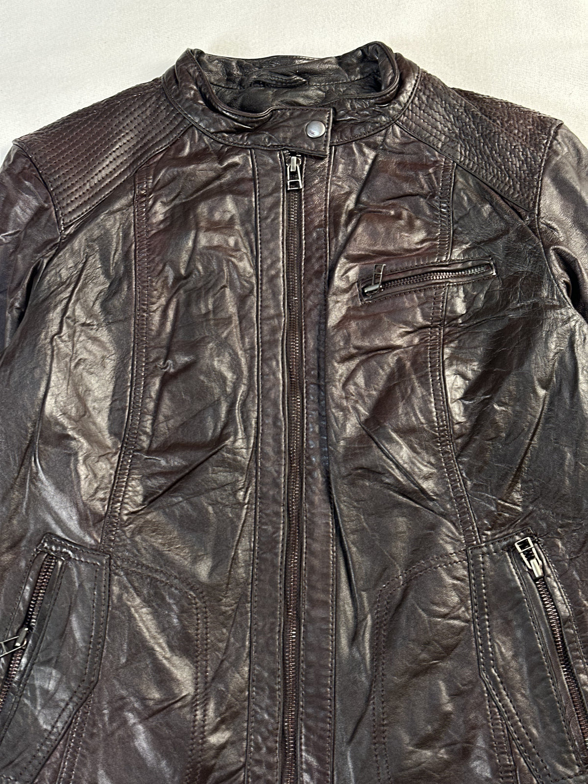 The size M brown cafe racer, 23 inches long through the body