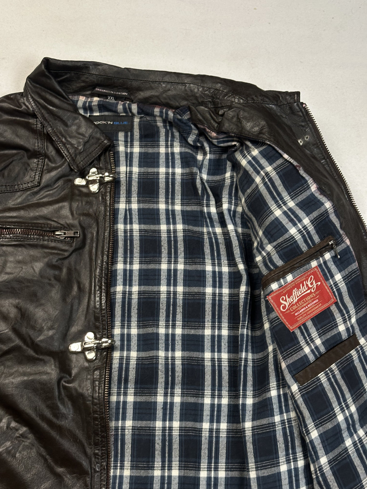 Brown real leather jacket with a 26 inch sleeve, size XL