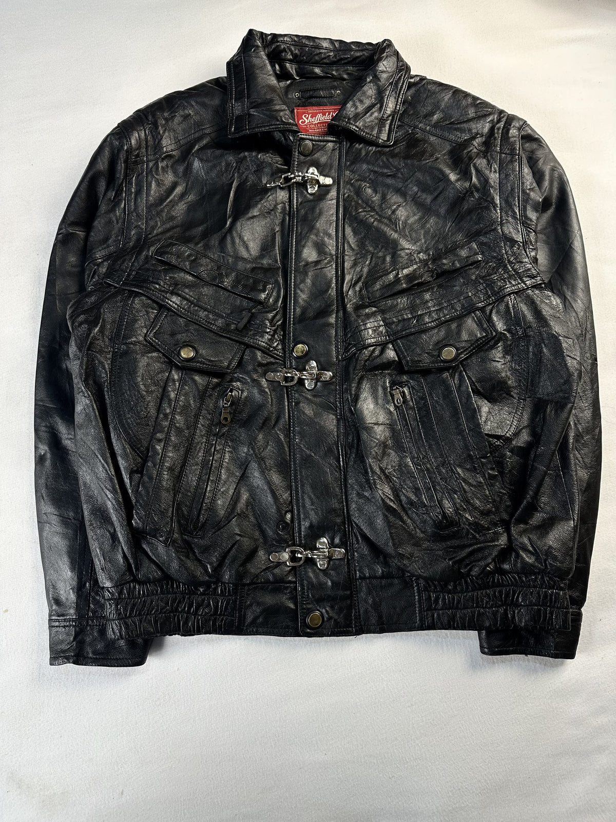 Black leather vintage jacket, size XL - chest and pocket detail.