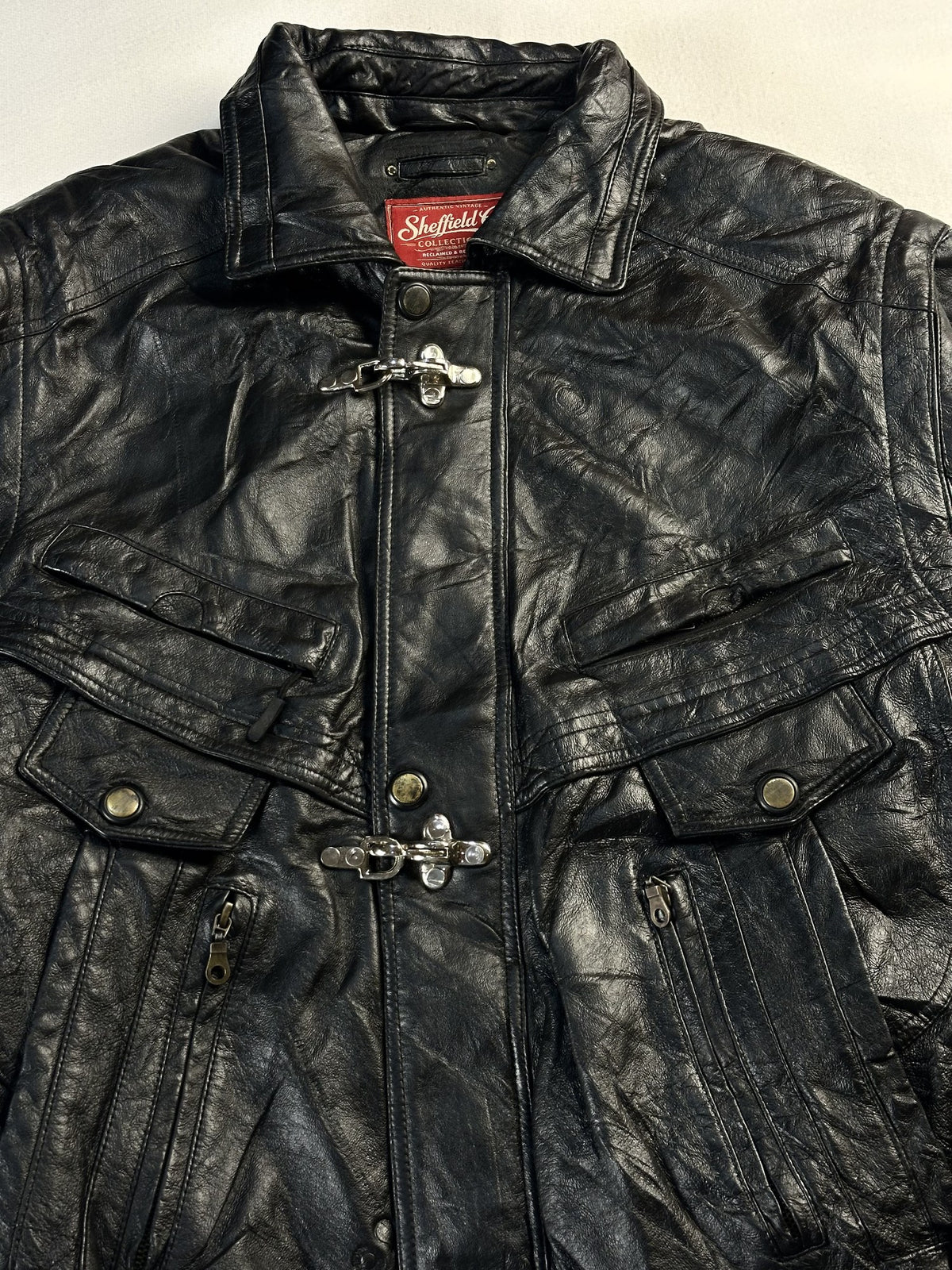 Black leather vintage jacket, size XL - back view.