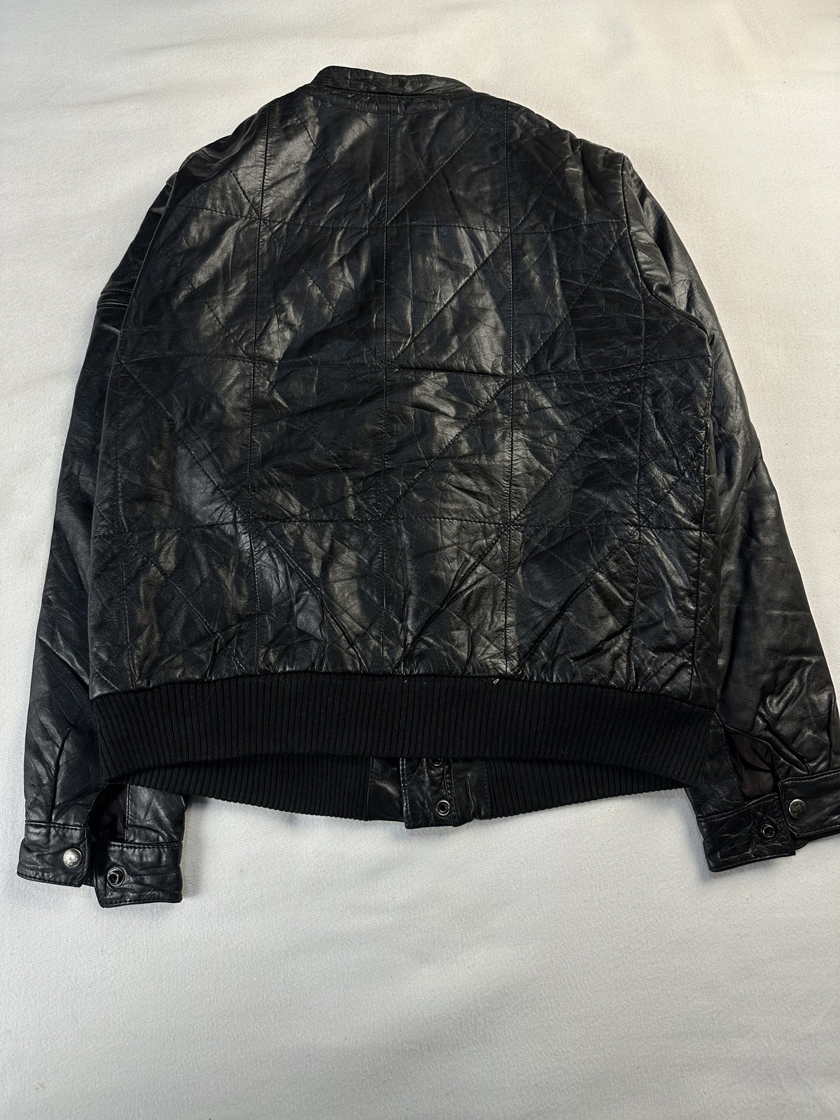 Black leather bomber jacket, size S - collar detail.