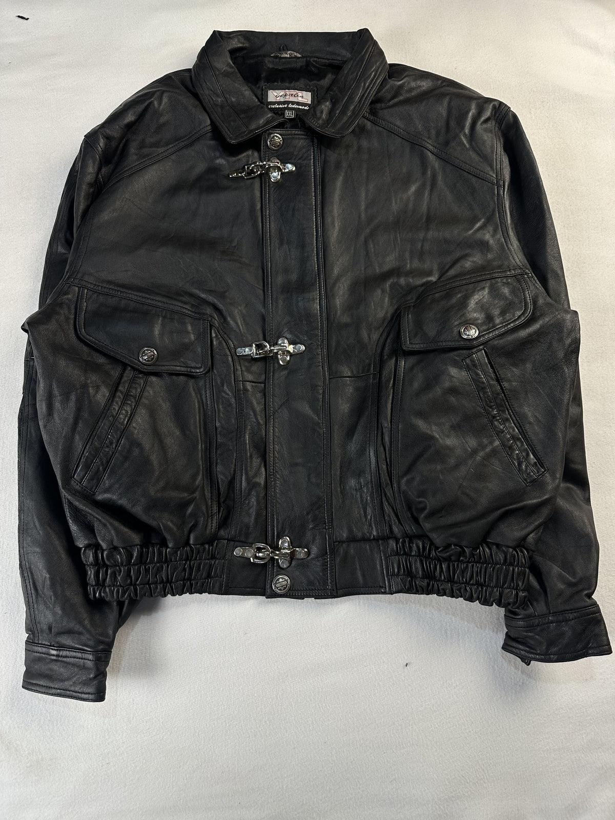 Black leather vintage jacket, size L - chest and pocket detail.