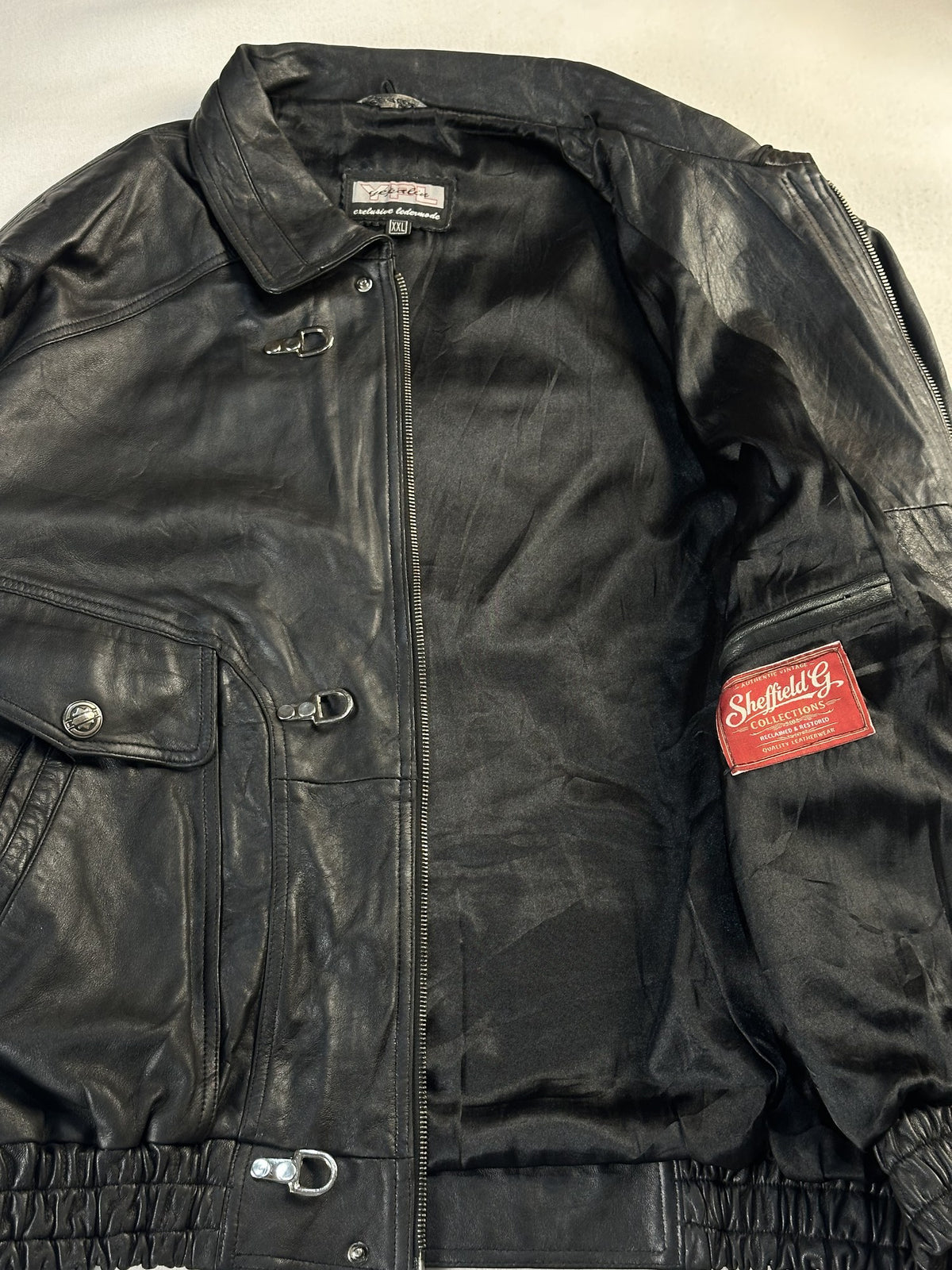 Black leather vintage jacket, size L - interior lining.