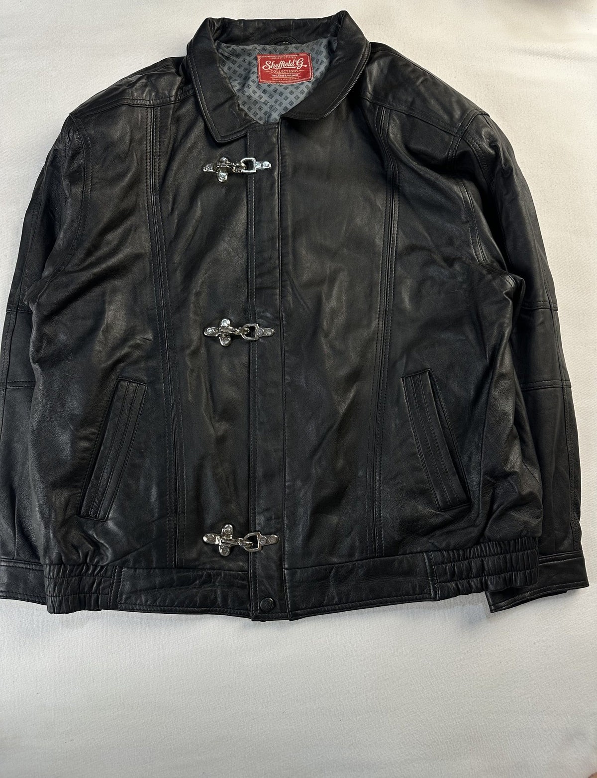 Black leather vintage jacket, size L - chest and pocket detail.