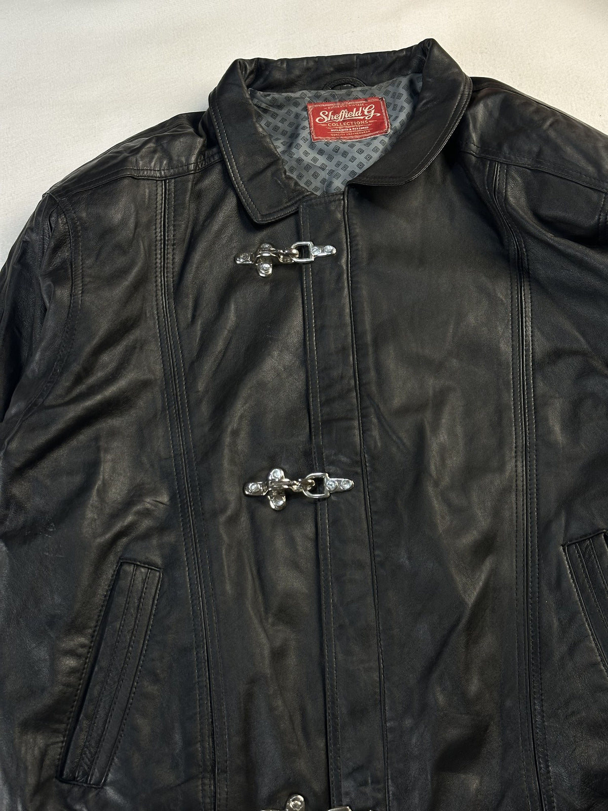 Black leather vintage jacket, size L - back view.