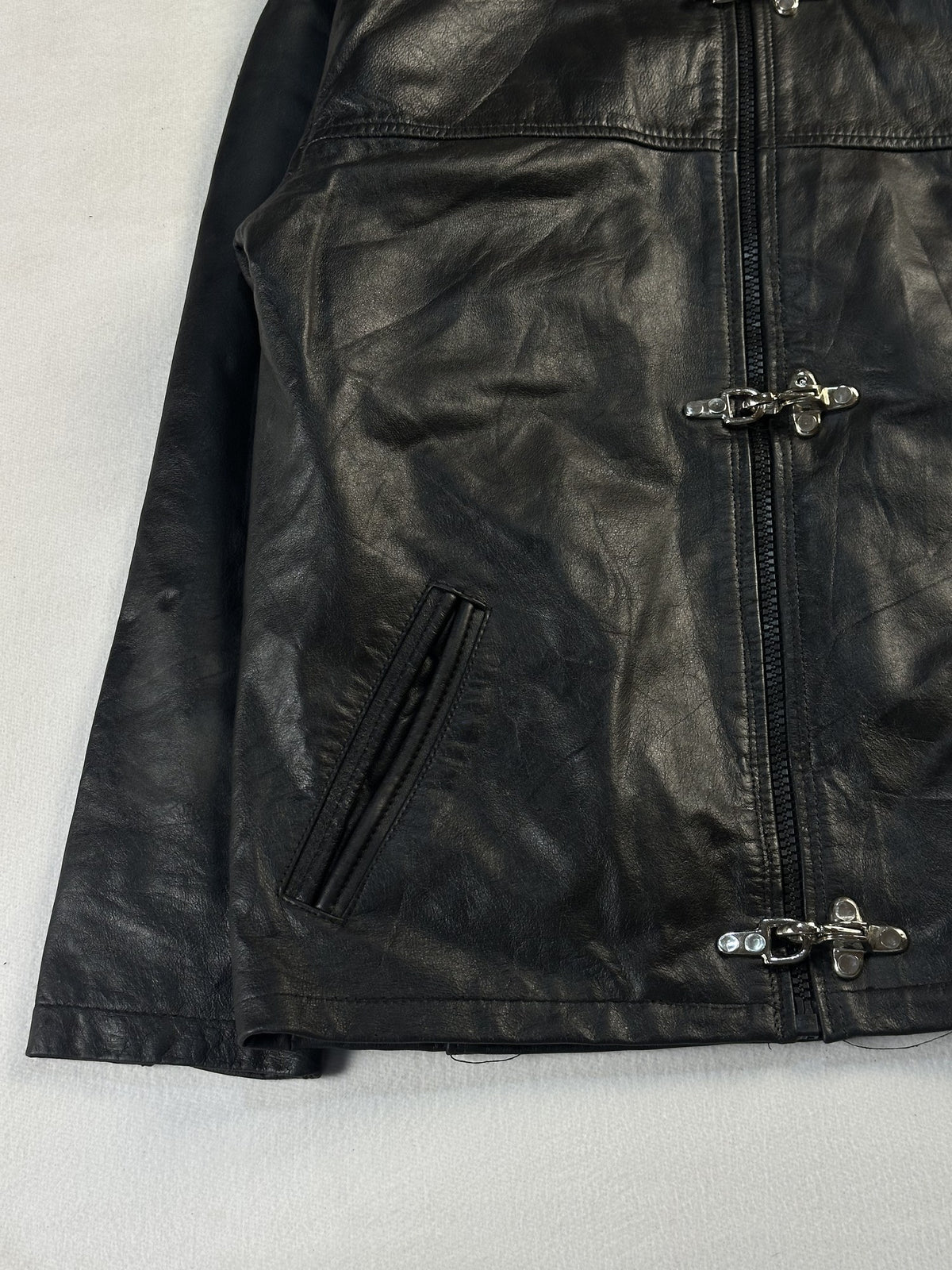 Black leather cafe racer jacket, size L - sleeve and cuff.