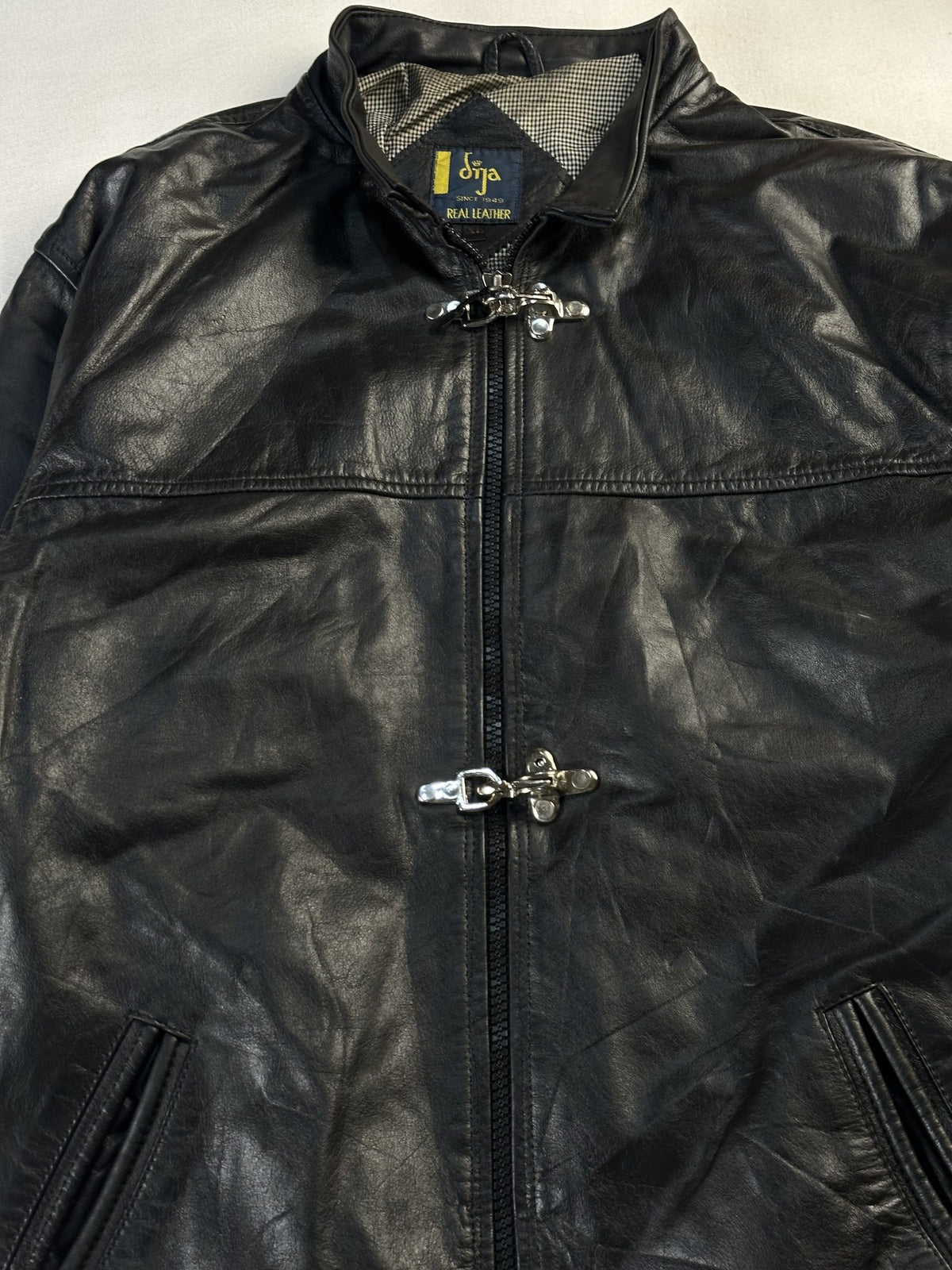 Black leather cafe racer jacket, size L - back view.