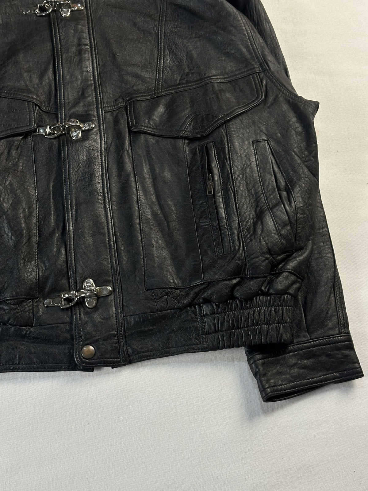 Black leather vintage jacket, size M - size and label context.