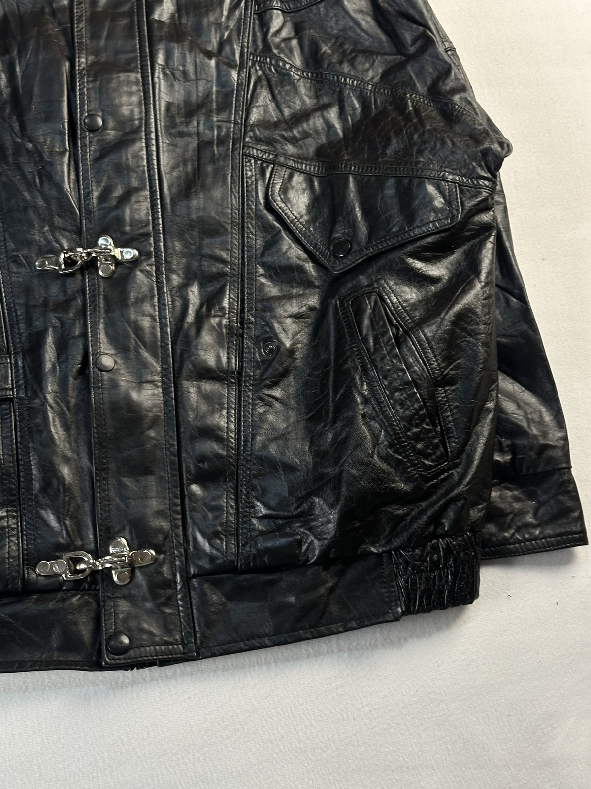 Black leather vintage jacket, size L - size and label context.