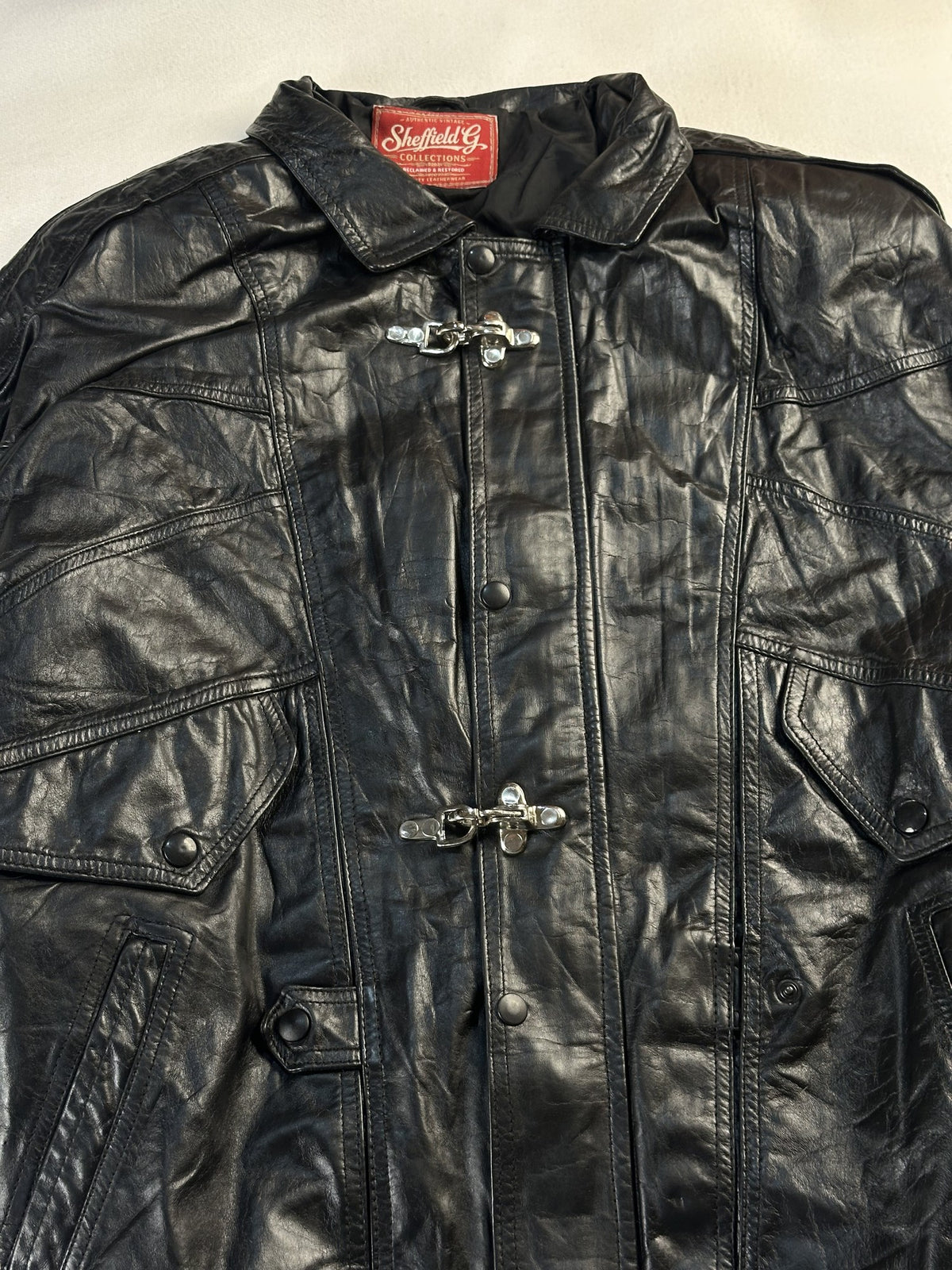 Black leather vintage jacket, size L - back view.