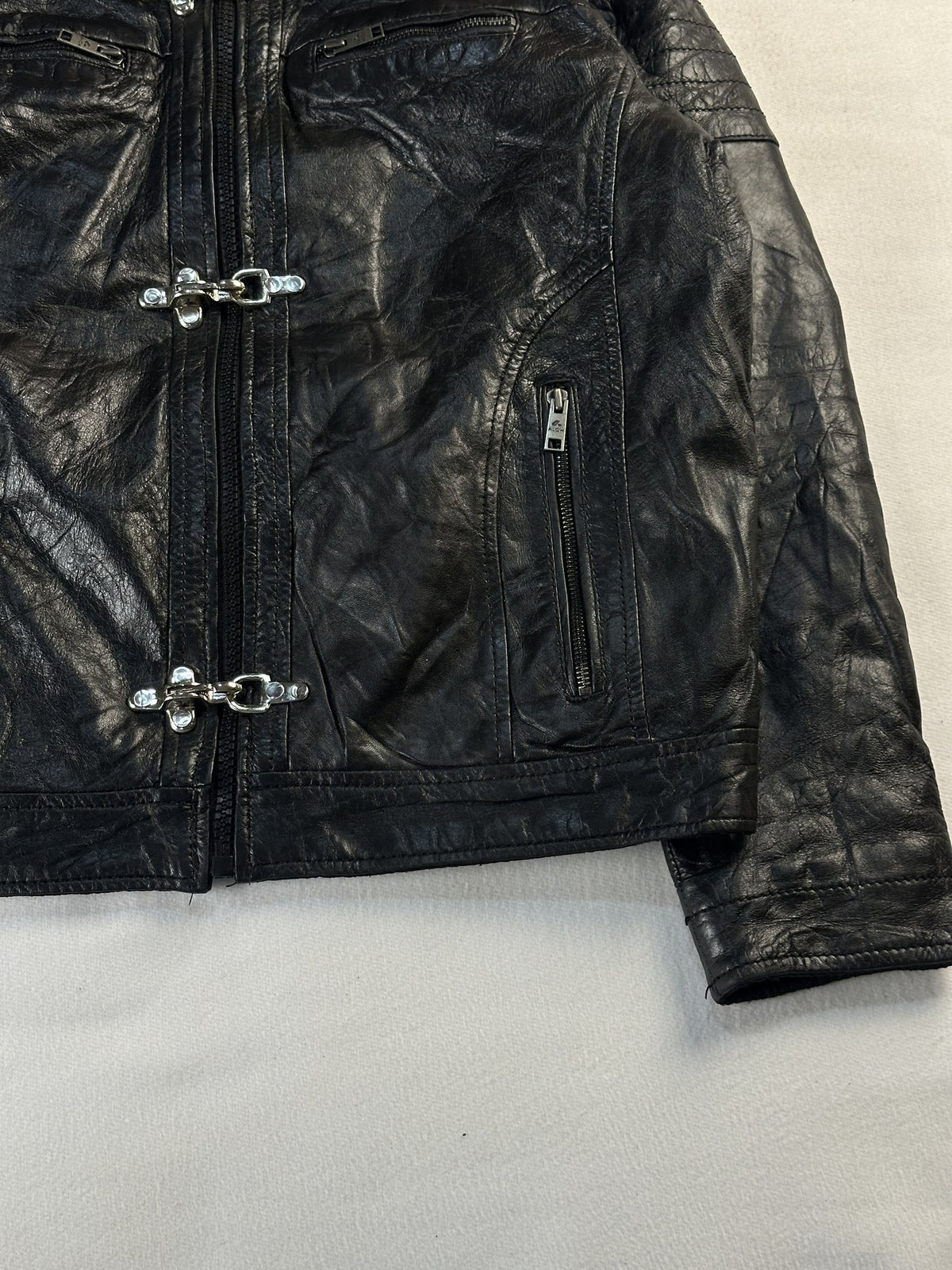 Black leather vintage jacket, size M - size and label context.
