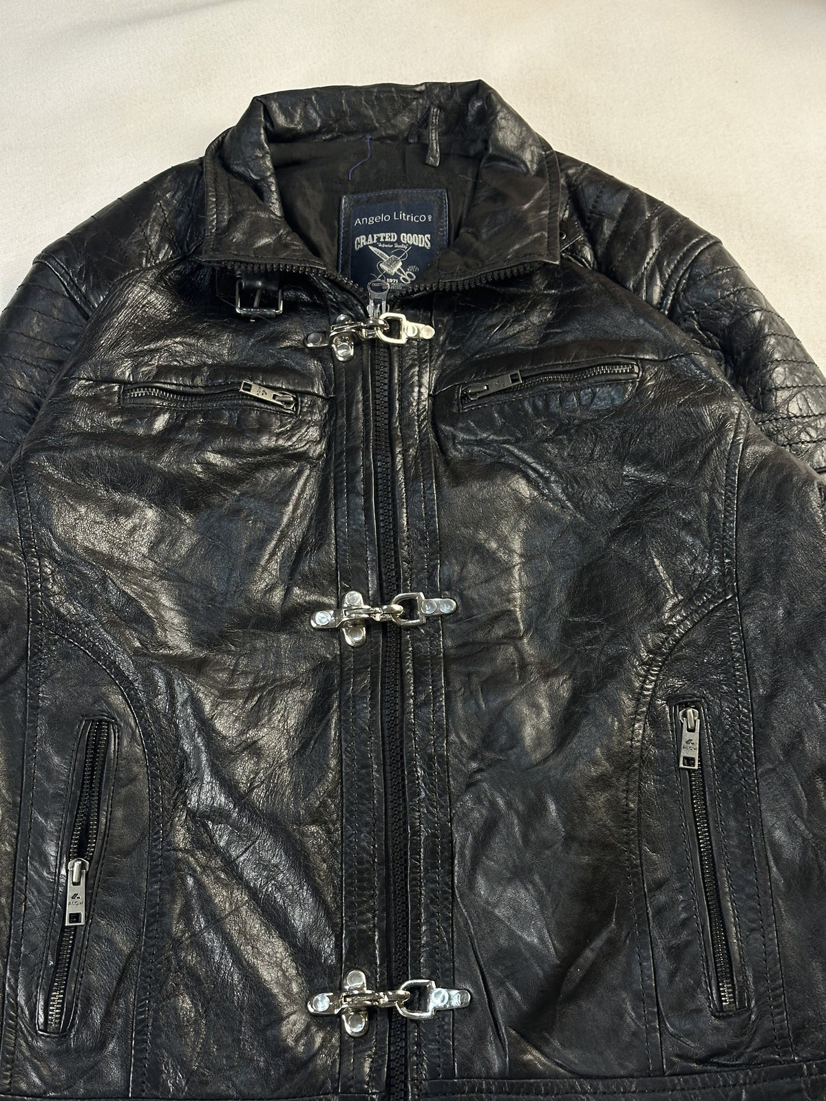 Black leather vintage jacket, size M - back view.