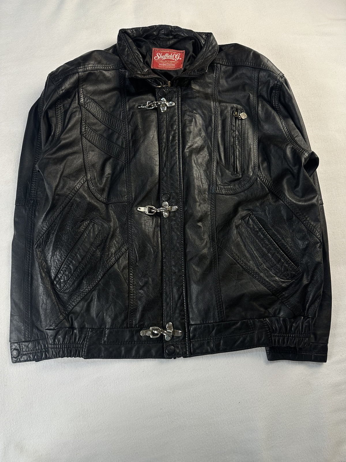 Black leather vintage jacket, size L - chest and pocket detail.