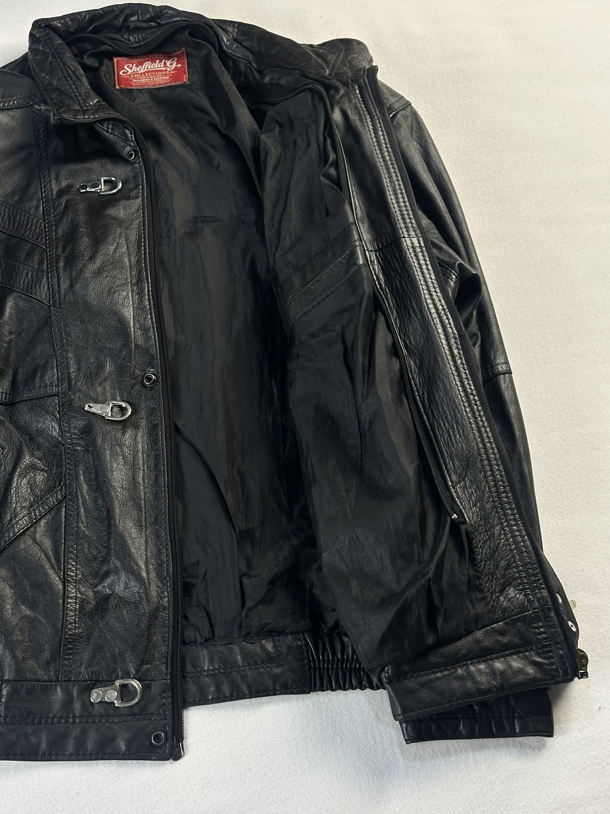 Black leather vintage jacket, size L - interior lining.