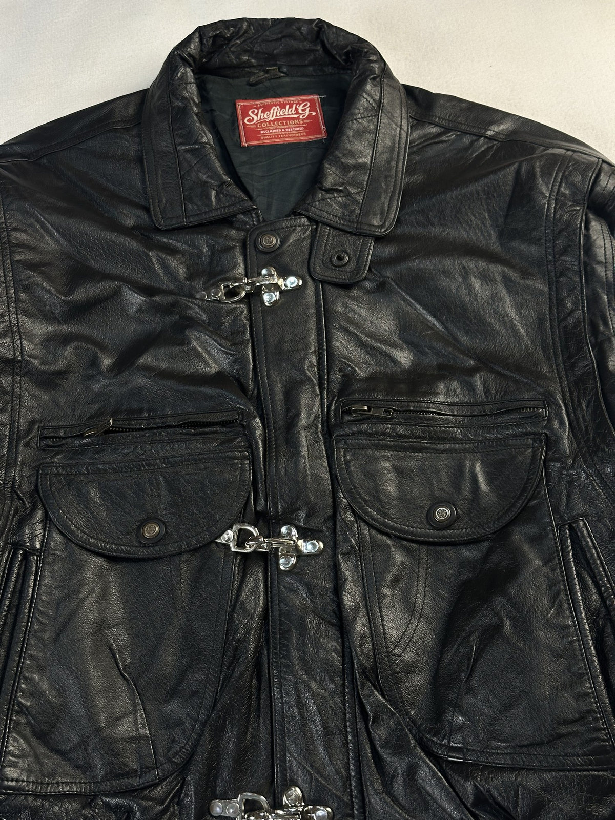 Black leather vintage jacket, size M - back view.