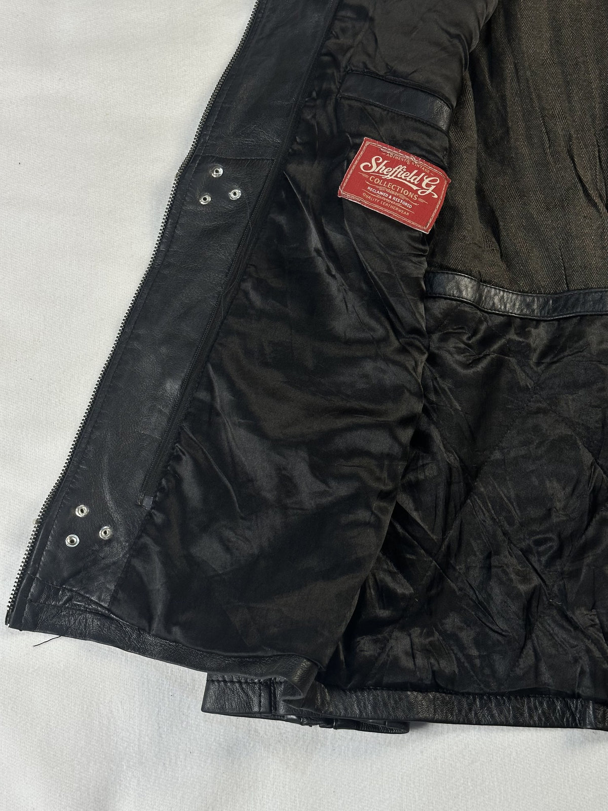 Black leather field jacket, size L - interior lining.