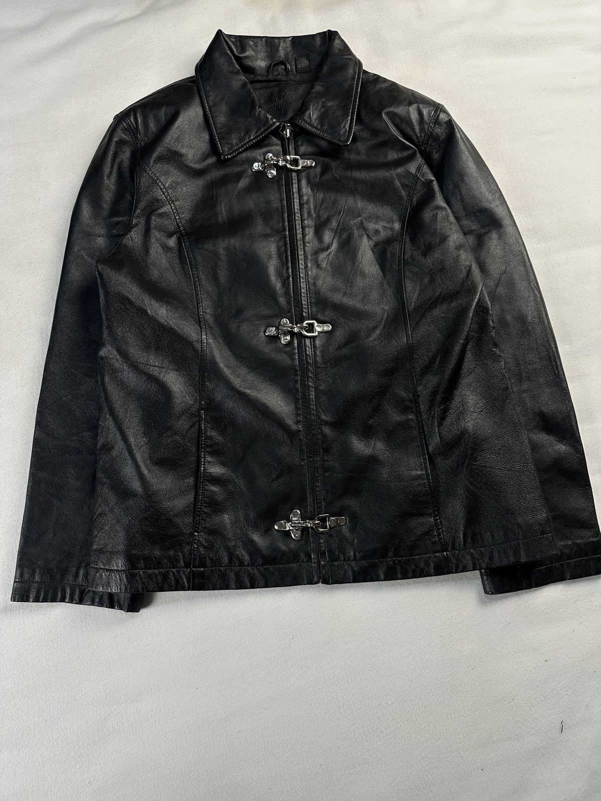 Black leather vintage jacket, size M - chest and pocket detail.