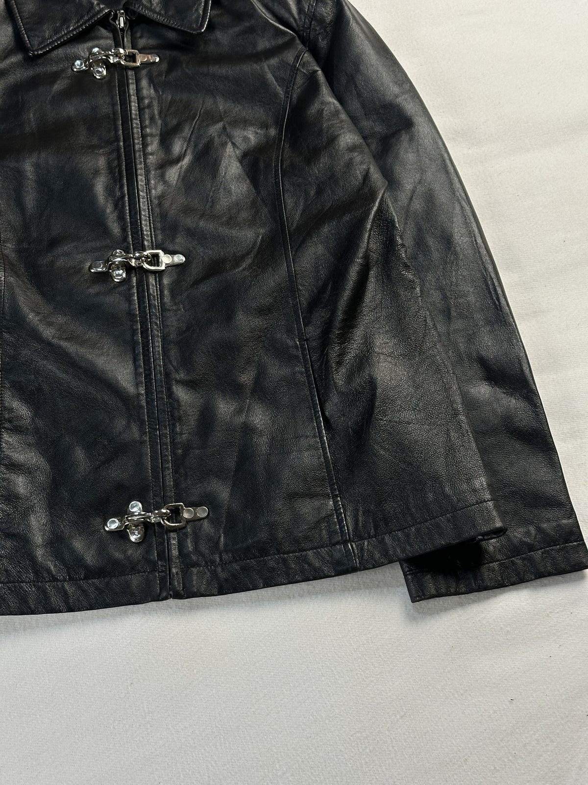 Black leather vintage jacket, size M - size and label context.
