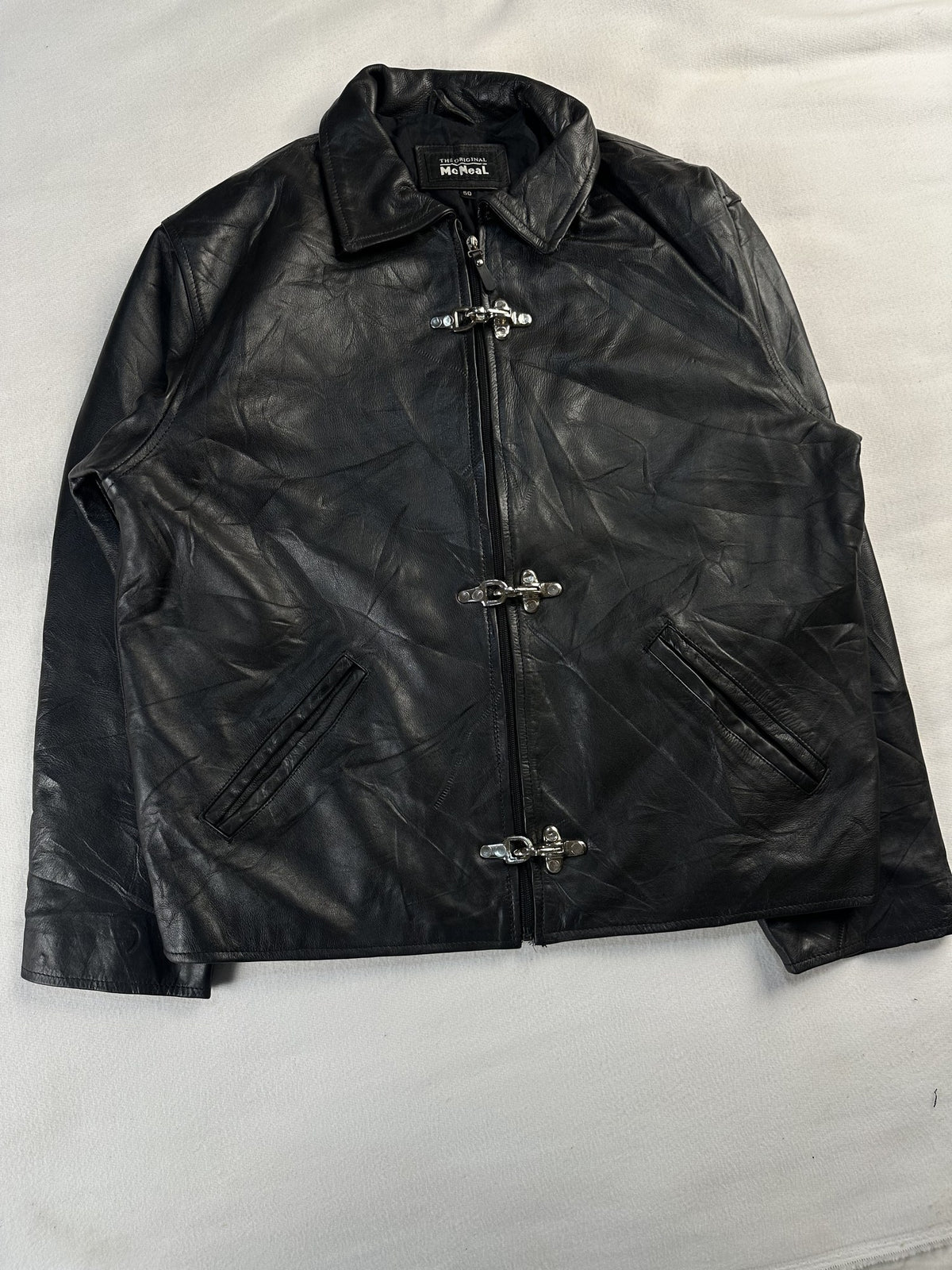 Black leather vintage jacket, size L - chest and pocket detail.