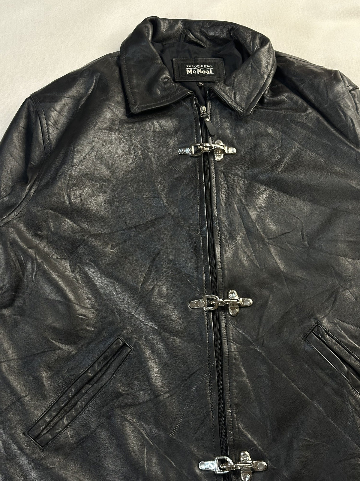 Black leather vintage jacket, size L - back view.