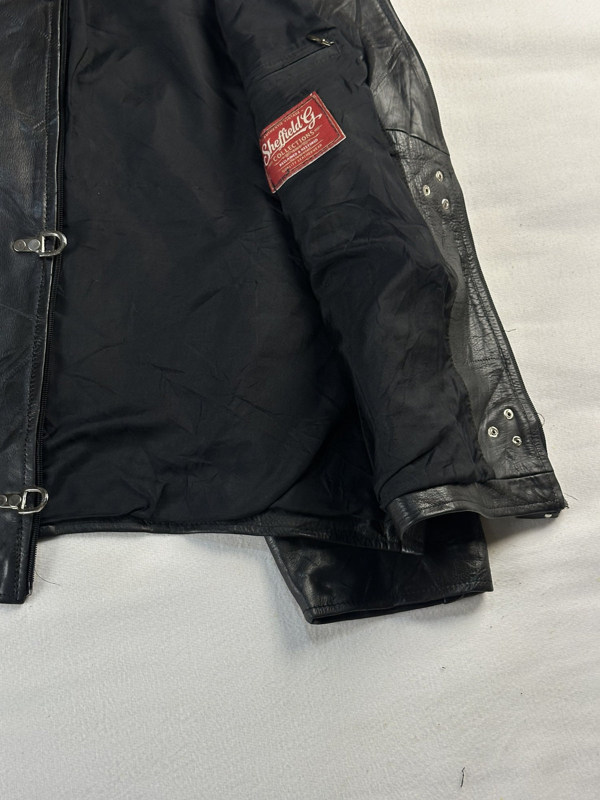 Black leather vintage jacket, size L - interior lining.