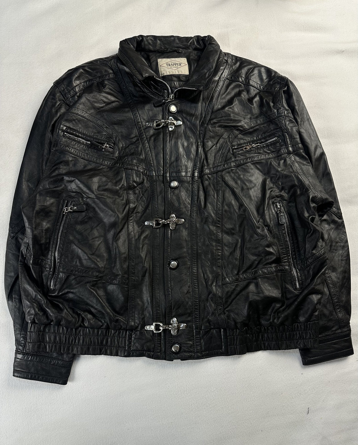 Black leather vintage jacket, size XL - chest and pocket detail.