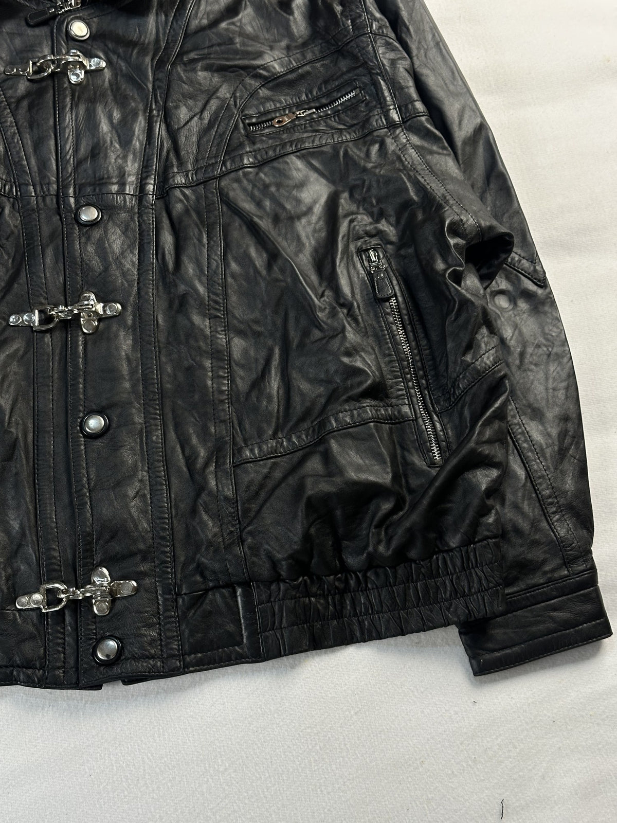 Black leather vintage jacket, size XL - size and label context.