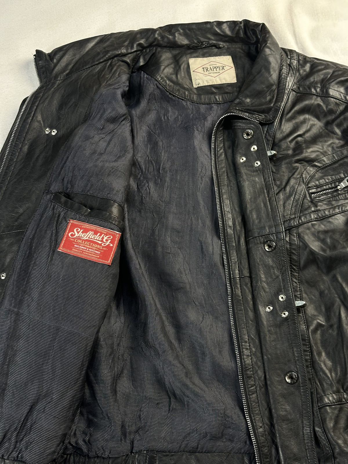 Black leather vintage jacket, size XL - interior lining.