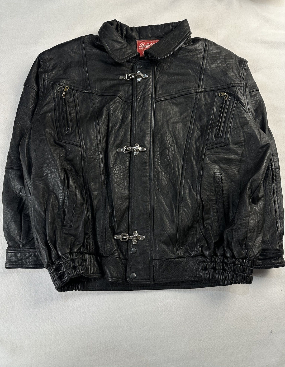 Black leather vintage jacket, size L - chest and pocket detail.