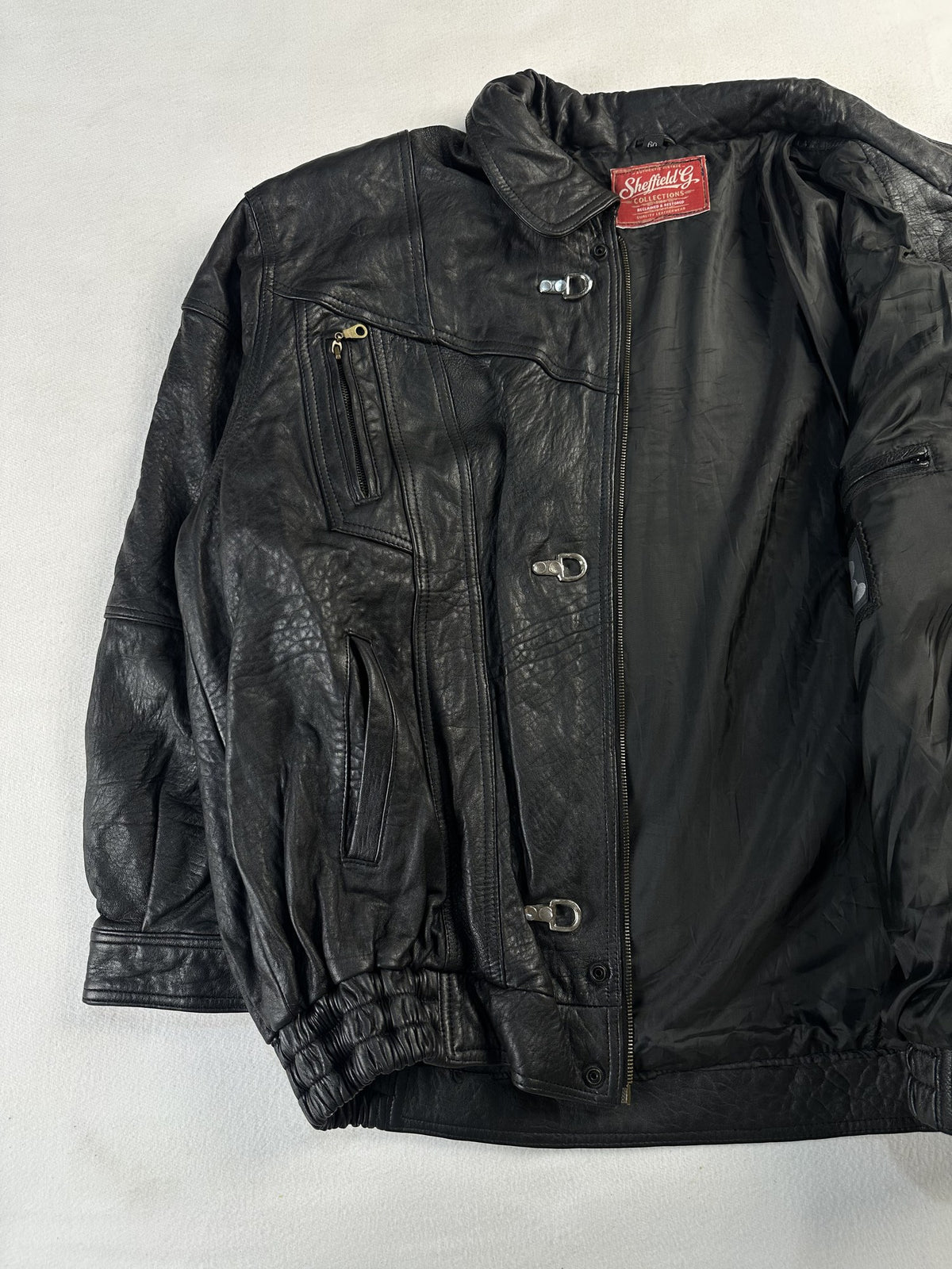 Black leather vintage jacket, size L - interior lining.