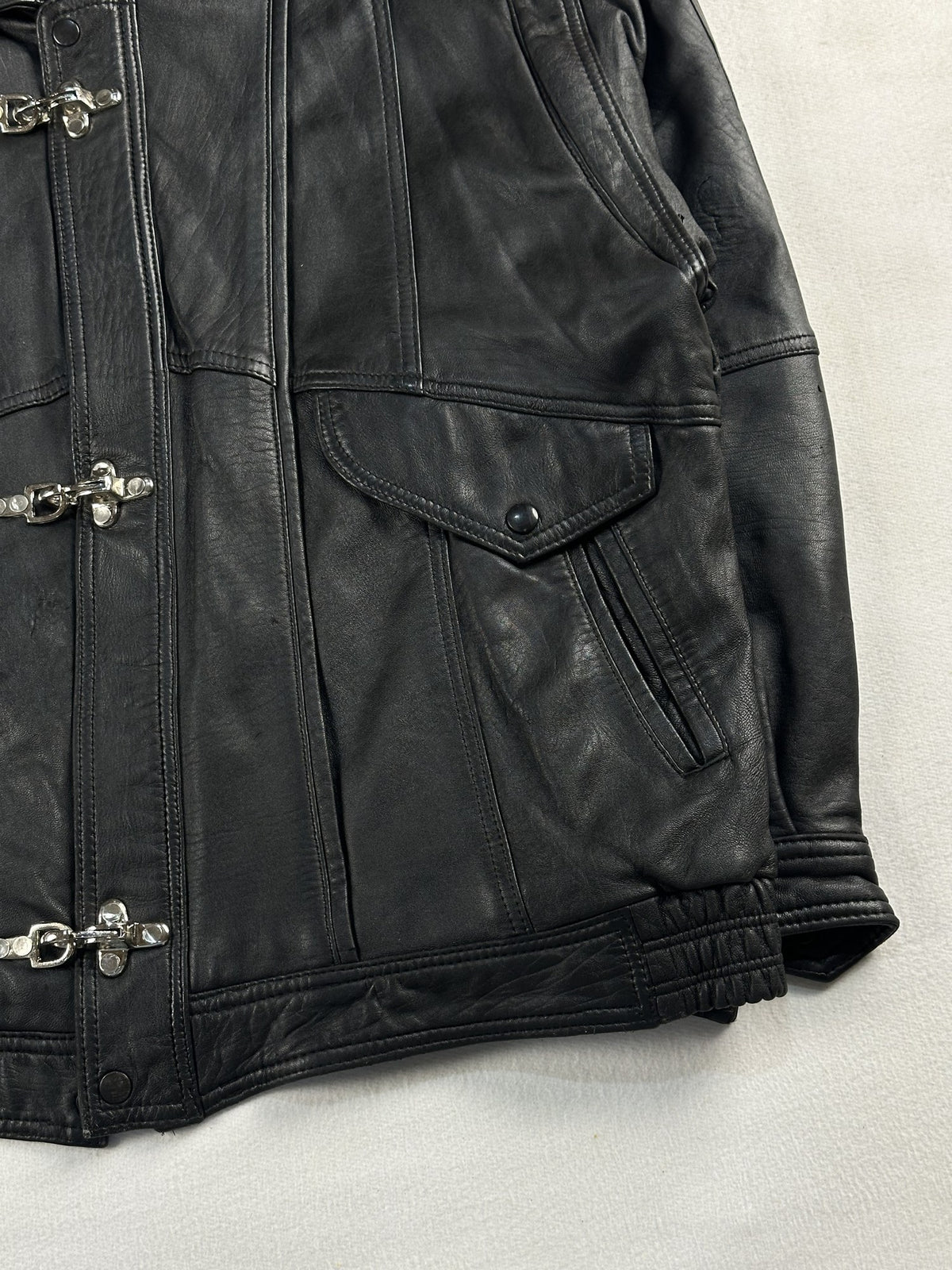 Black leather vintage jacket, size L - size and label context.