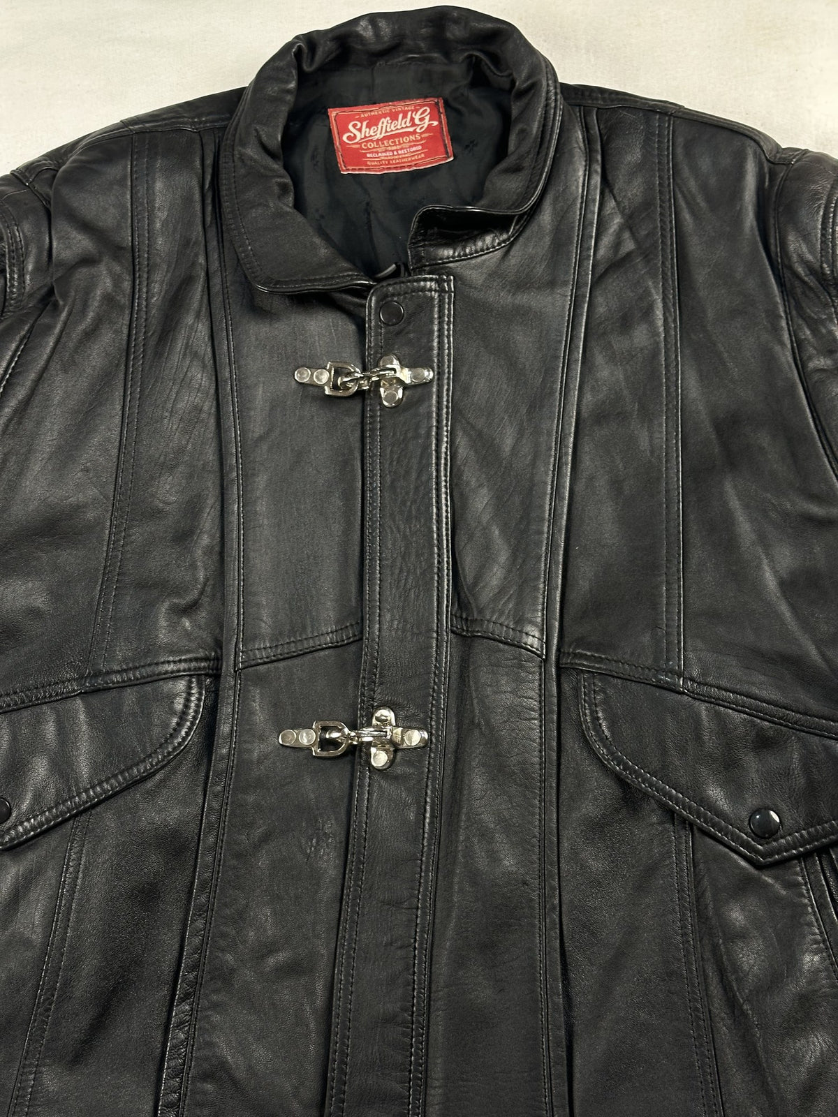 Black leather vintage jacket, size L - back view.