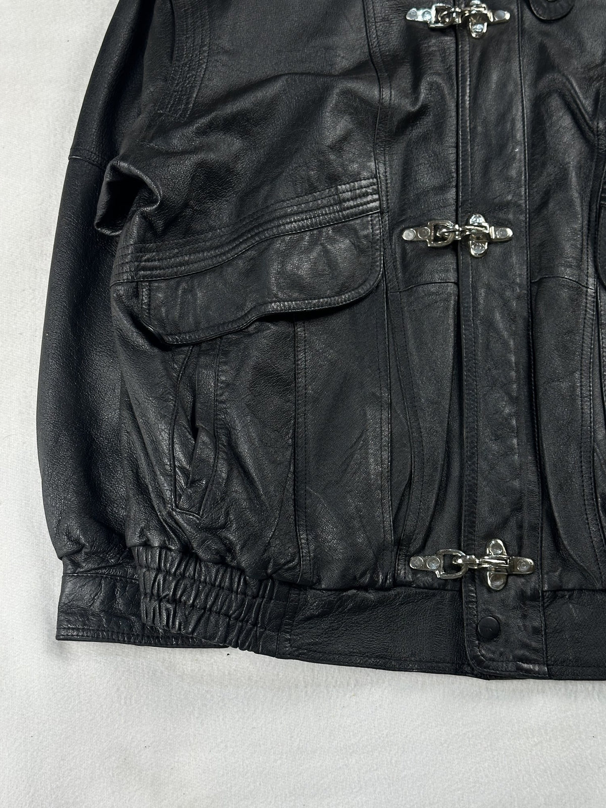 Black leather field jacket, size L - sleeve and cuff.