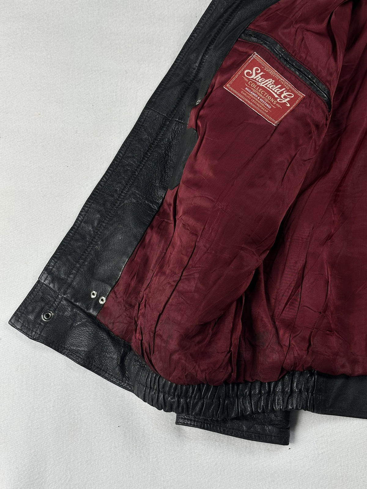 Black leather field jacket, size L - interior lining.