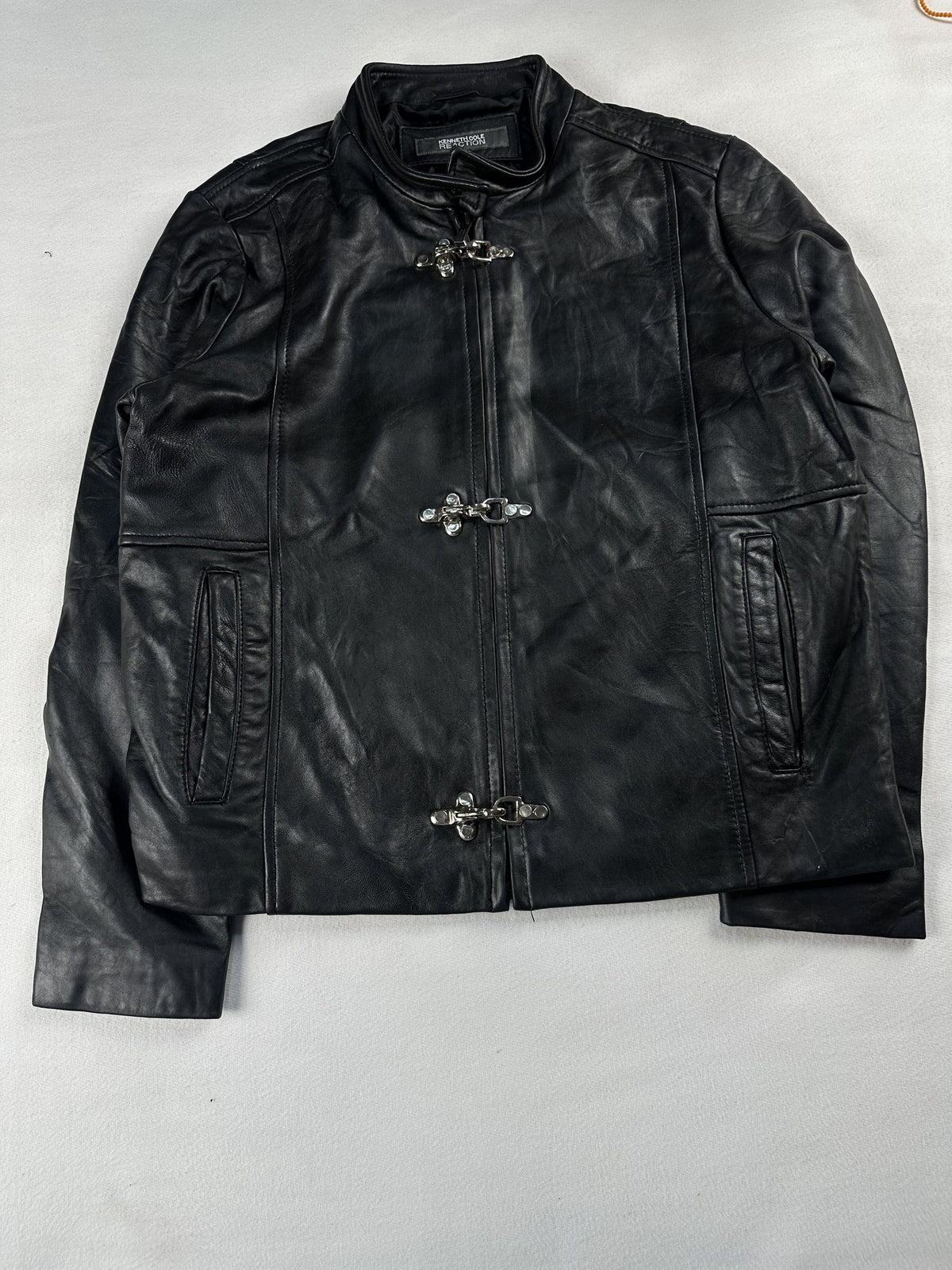 Black leather cafe racer jacket, size M - chest and pocket detail.