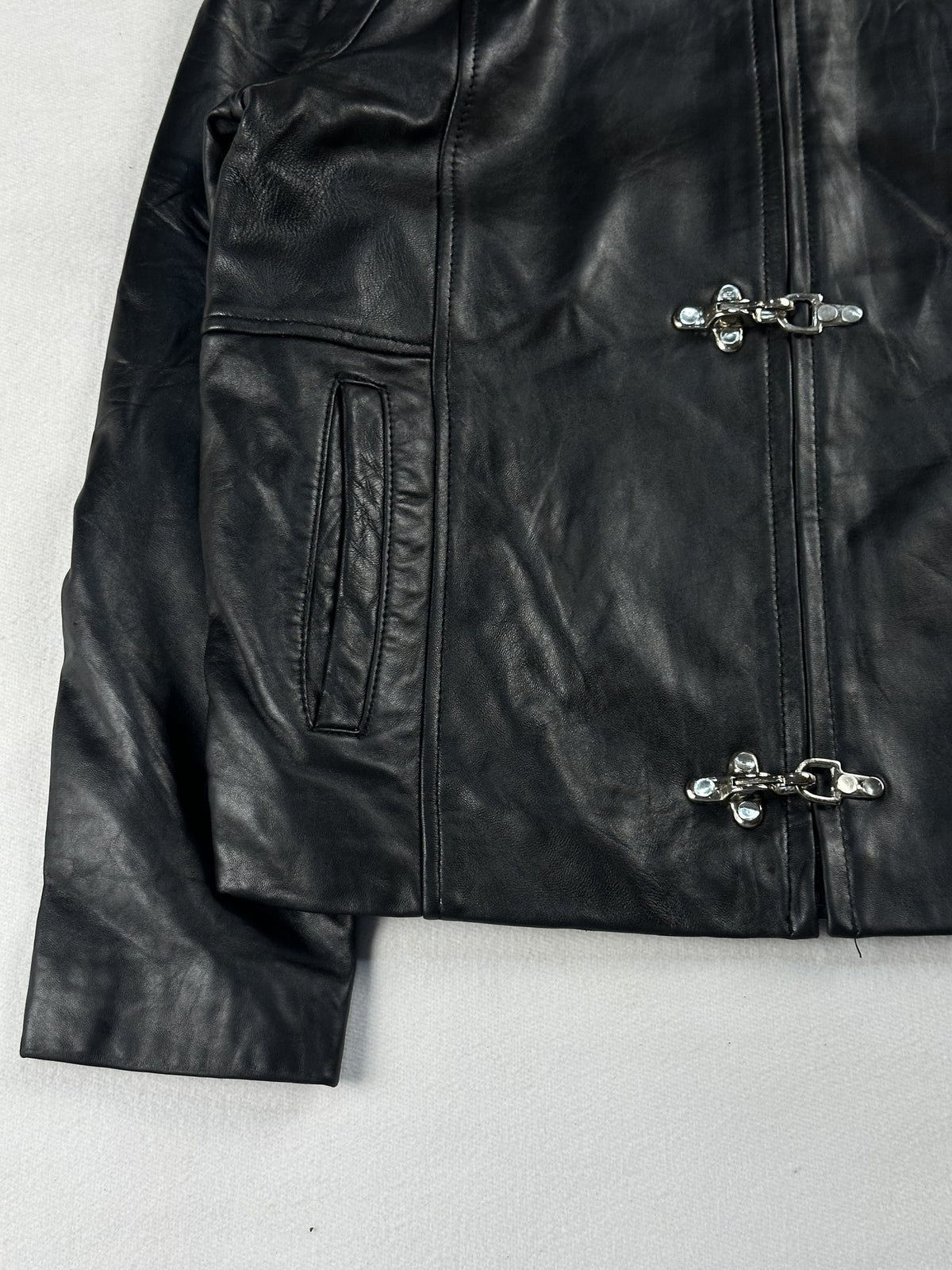 Black leather cafe racer jacket, size M - sleeve and cuff.