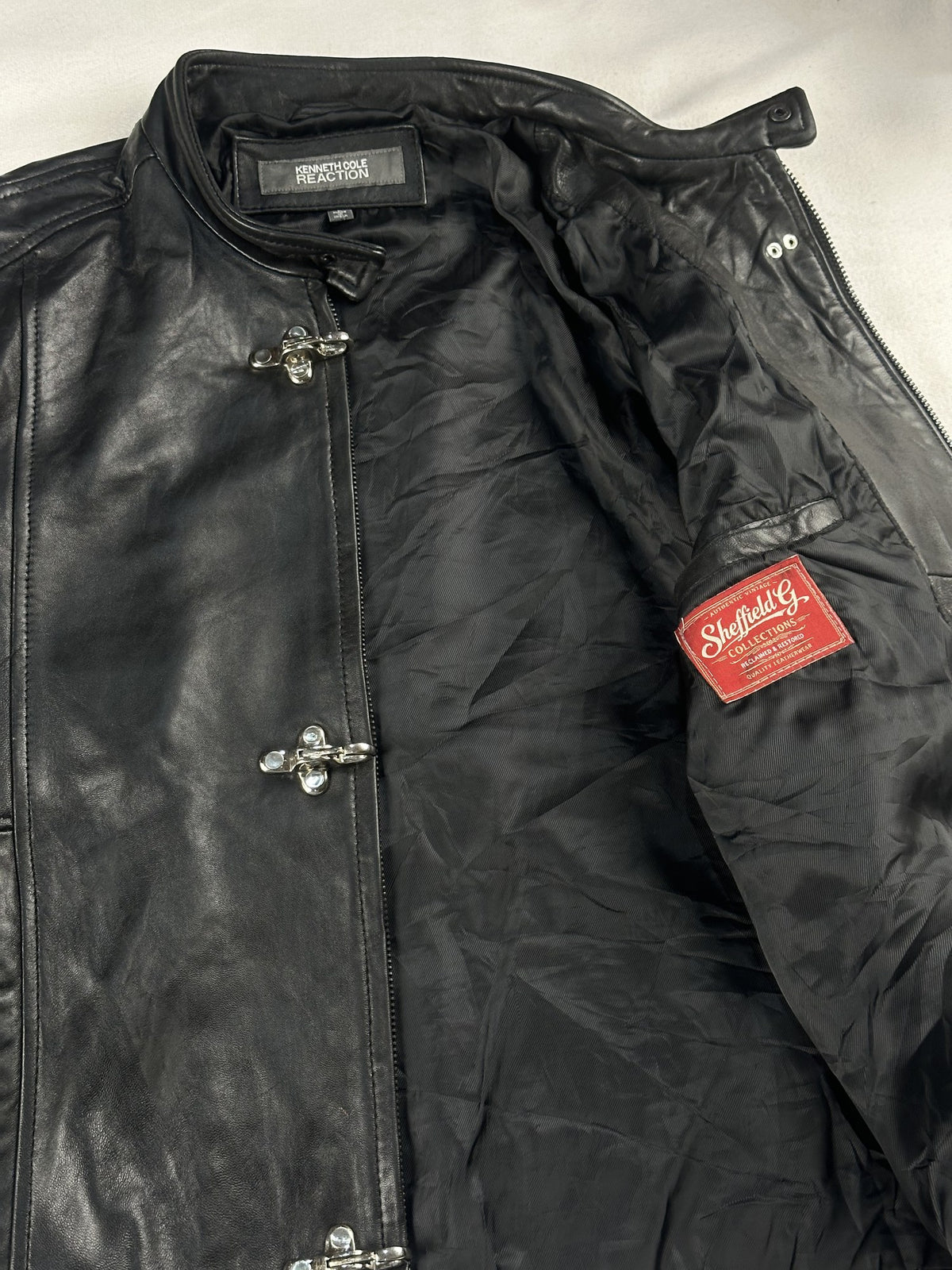 Black leather cafe racer jacket, size M - interior lining.