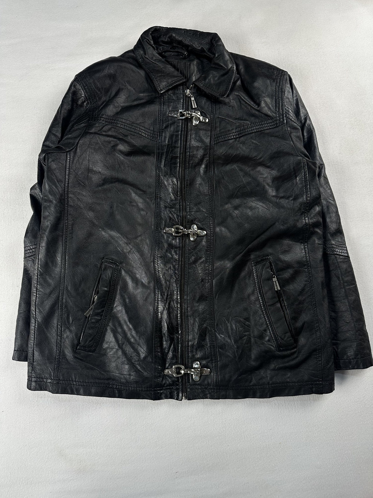 Black leather vintage jacket, size L - chest and pocket detail.