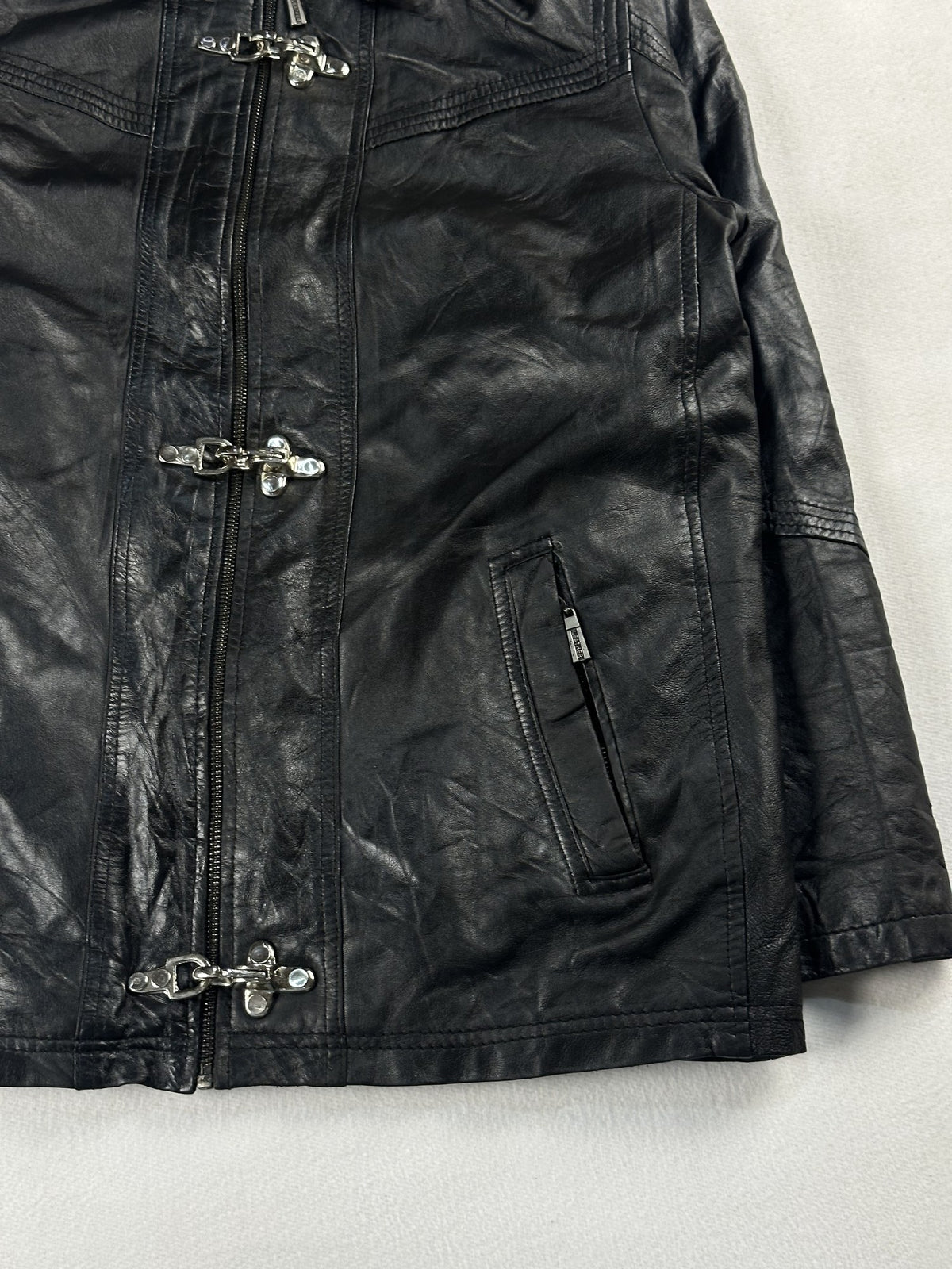 Black leather vintage jacket, size L - size and label context.