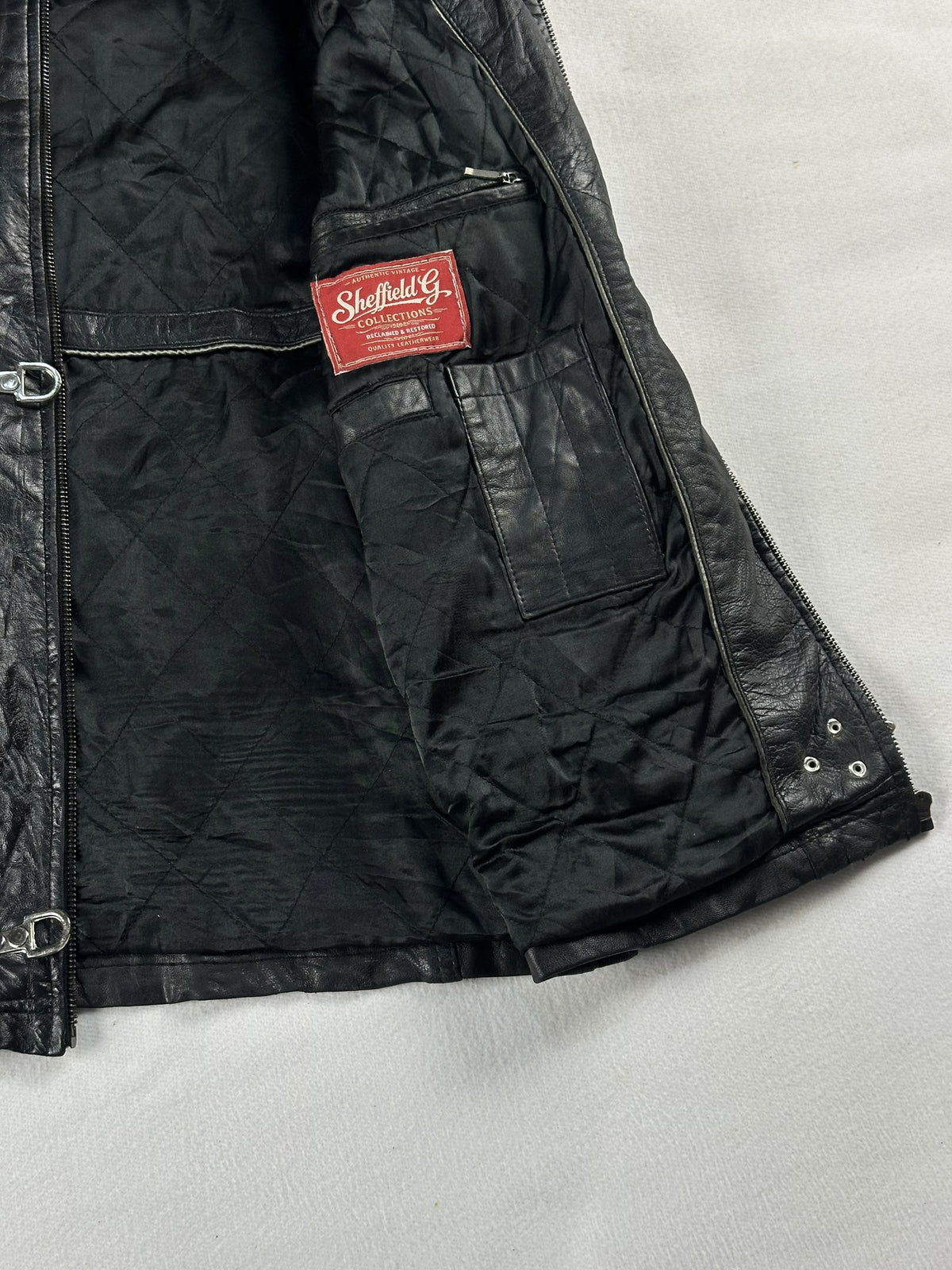 Black leather vintage jacket, size L - interior lining.