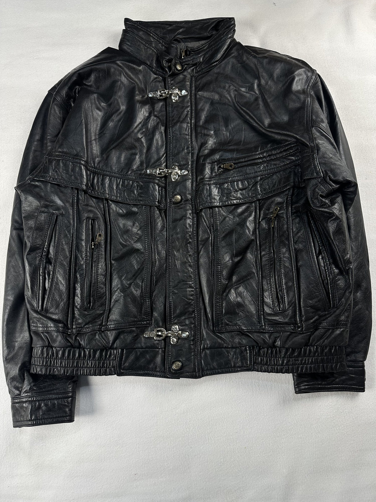Black leather vintage jacket, size L - chest and pocket detail.